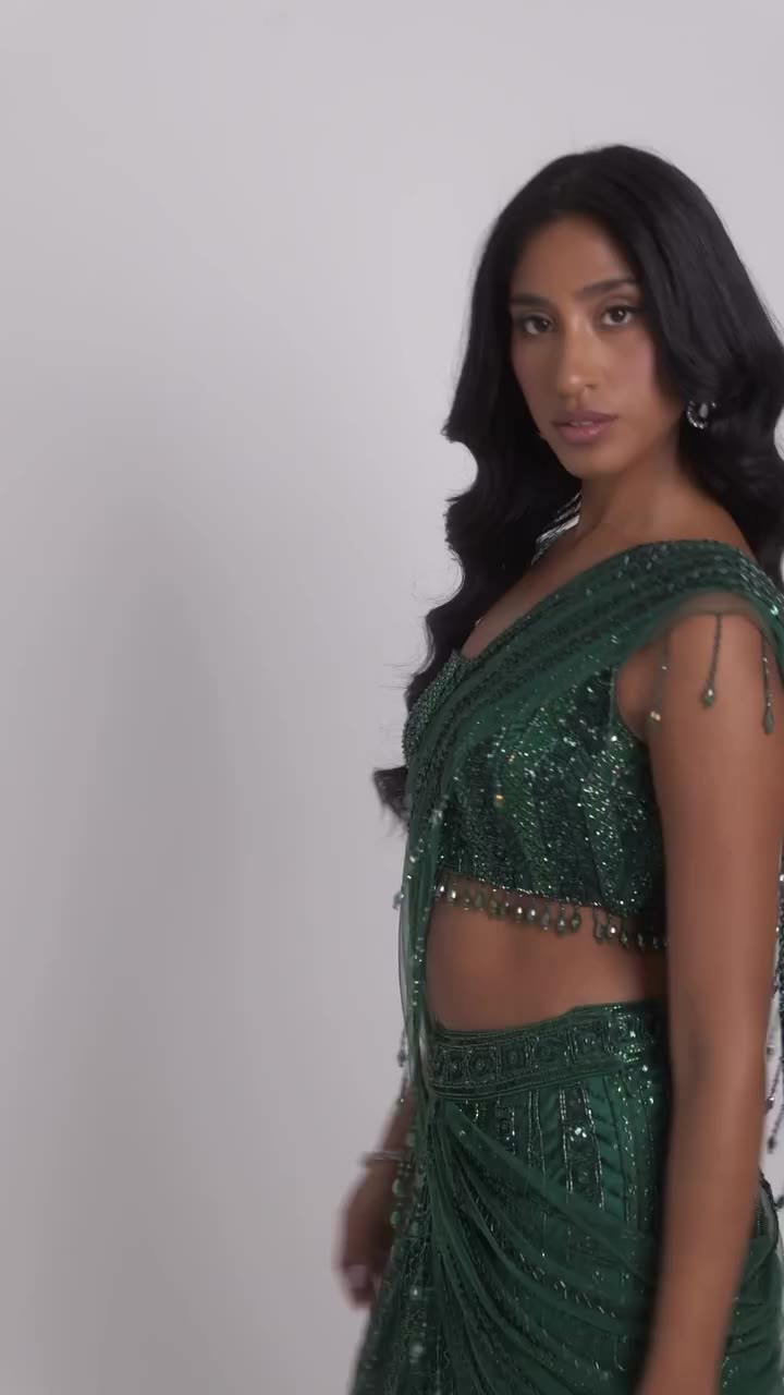 This isn't a sari you wear quietly. ✨ Tassels, sequins, built to stand out…