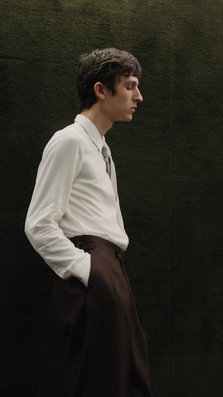 A study in quiet precision.⁣ An ecru ceremony shirt in fluid, matte EcoVero™…