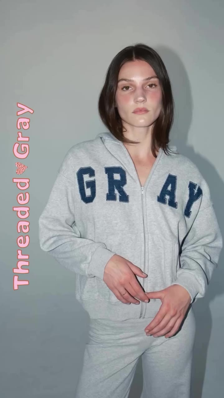 the cozy threaded gray pieces your fall wardrobe needs