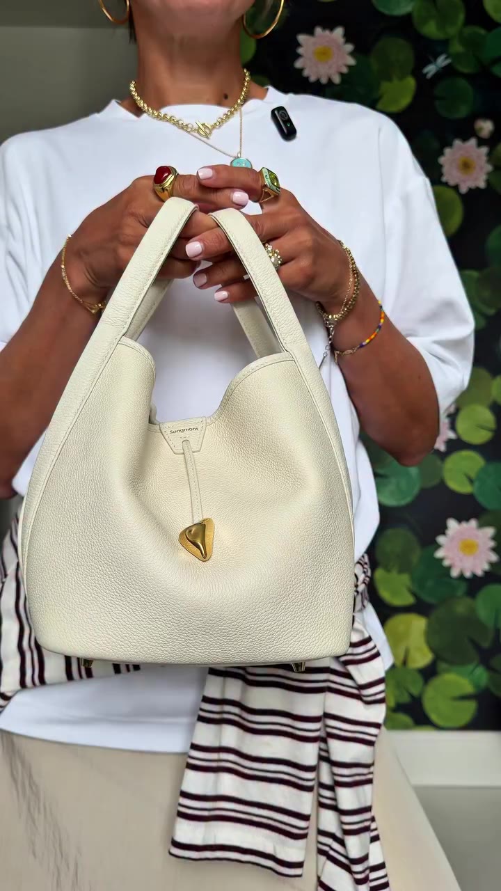 ad A bag that is not only beautiful, versatile, and holds so much more than…