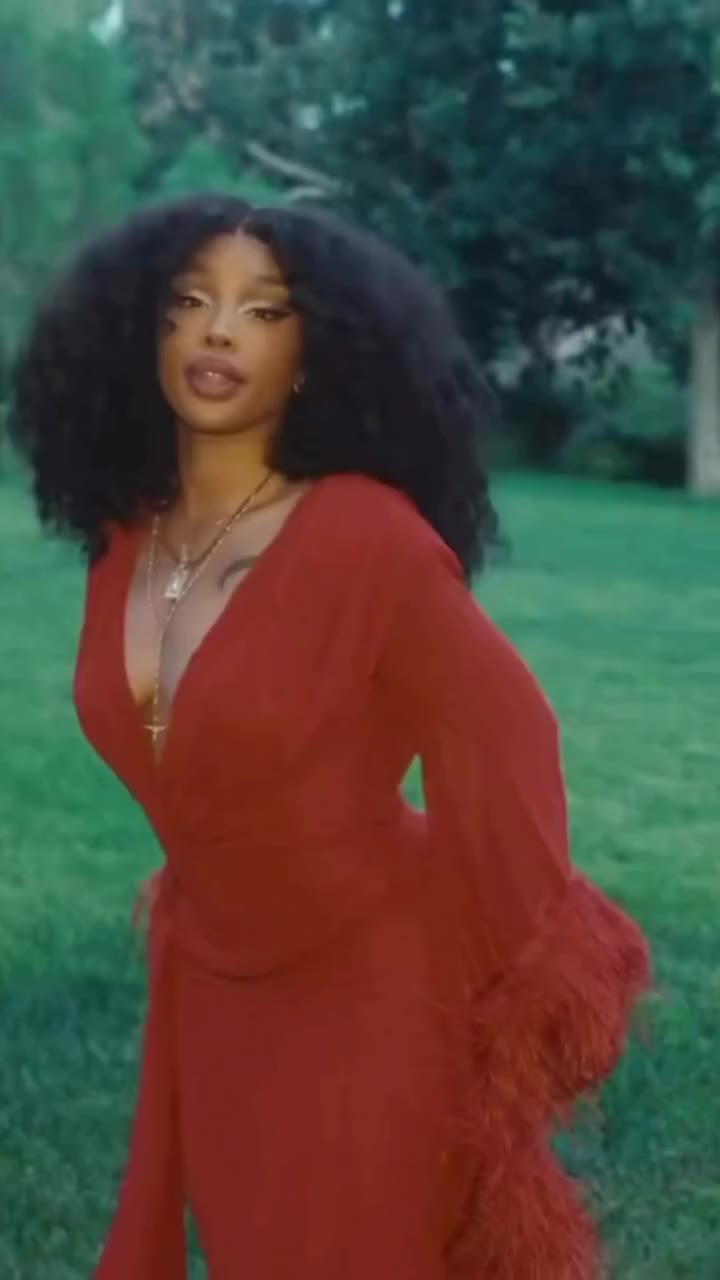An ethereal moment with @sza in the Geisha V-Neck Red Gown. ❤️ #BRONXBANCO
