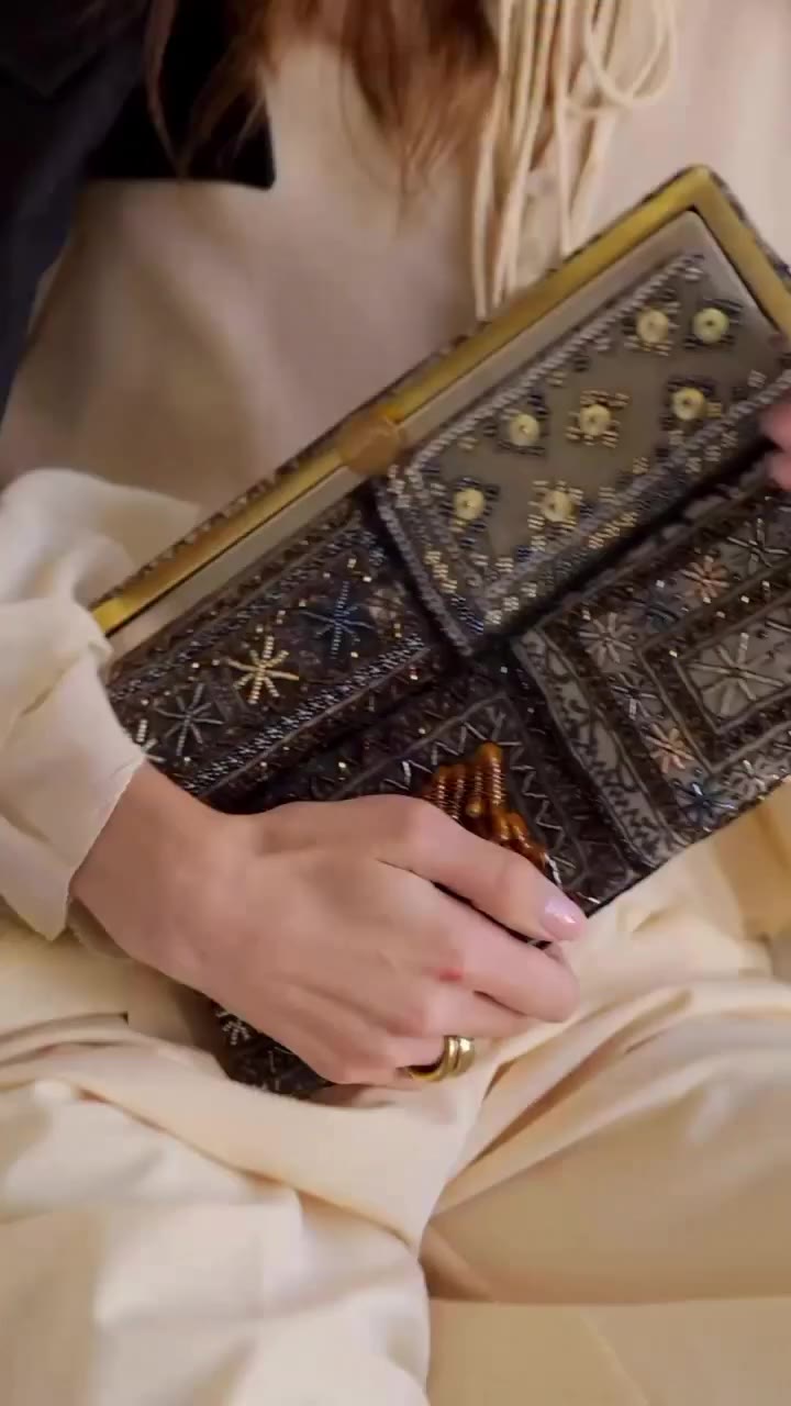 The Bedouin Grace Clutch Inspired by old Bedouin patchwork textiles…