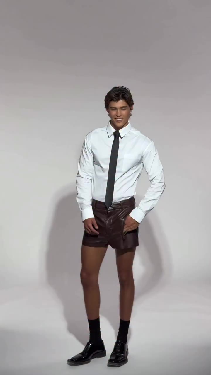 Modern office uniform: The Nicolas shorts in chocolate leather paired with a…