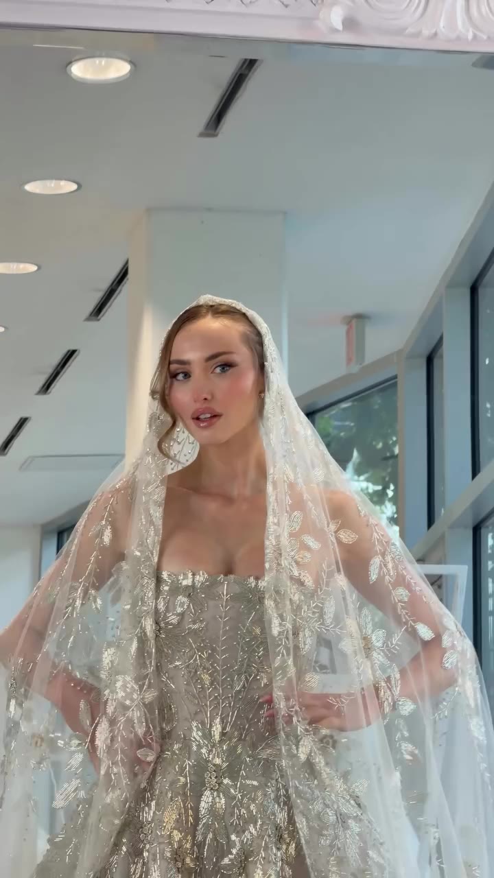A breathtaking vision of celestial opulence, the Celestia gown and matching…