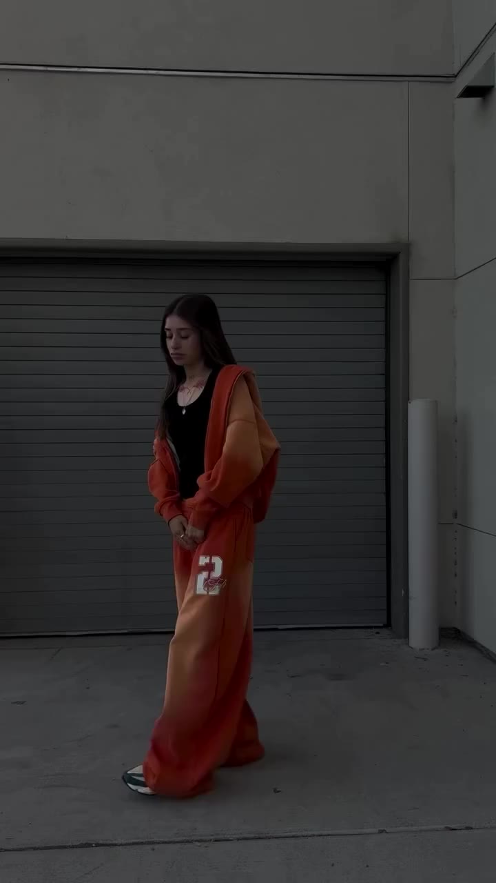 Too bold to blend in. Orange set, hood up, attitude on. Link in bio to shop…