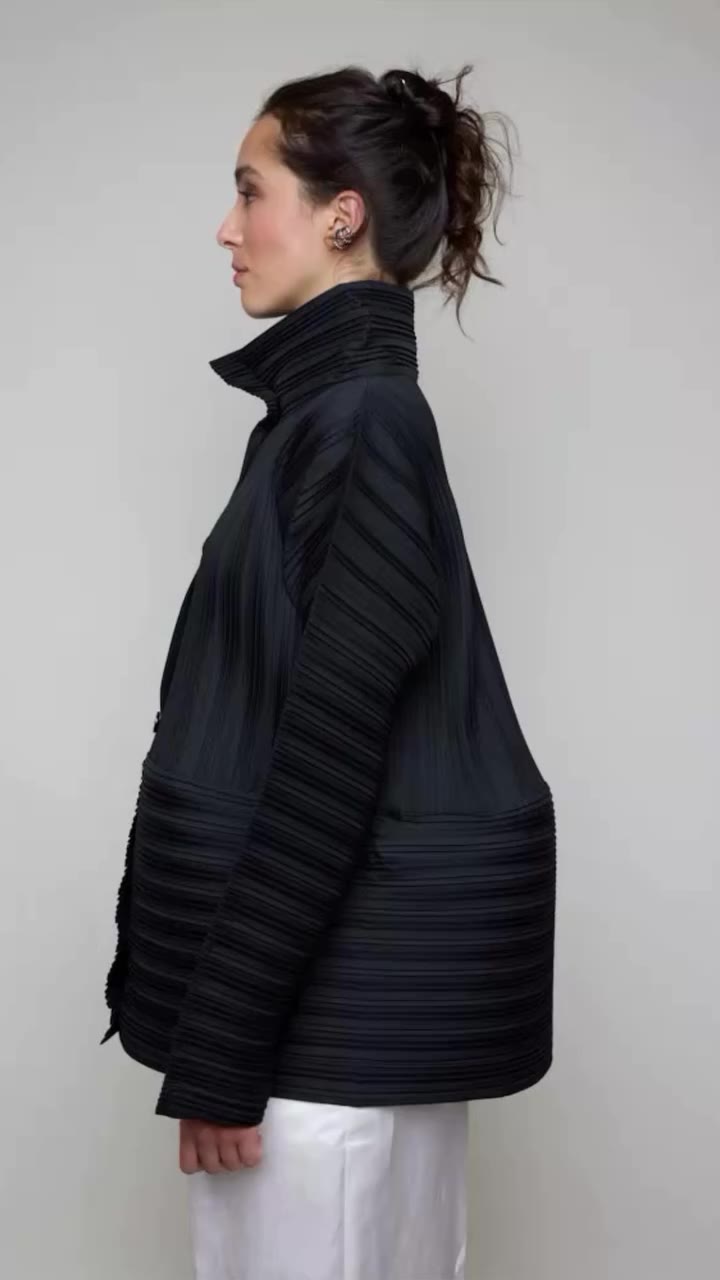 Pleats meets modern tailoring with this textured architectural jacket…