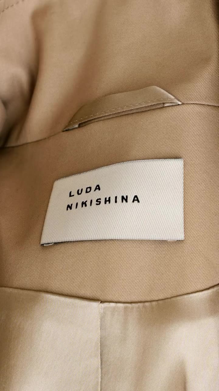 Aesthetics and details of the LIAM trench coat by Luda Nikishina