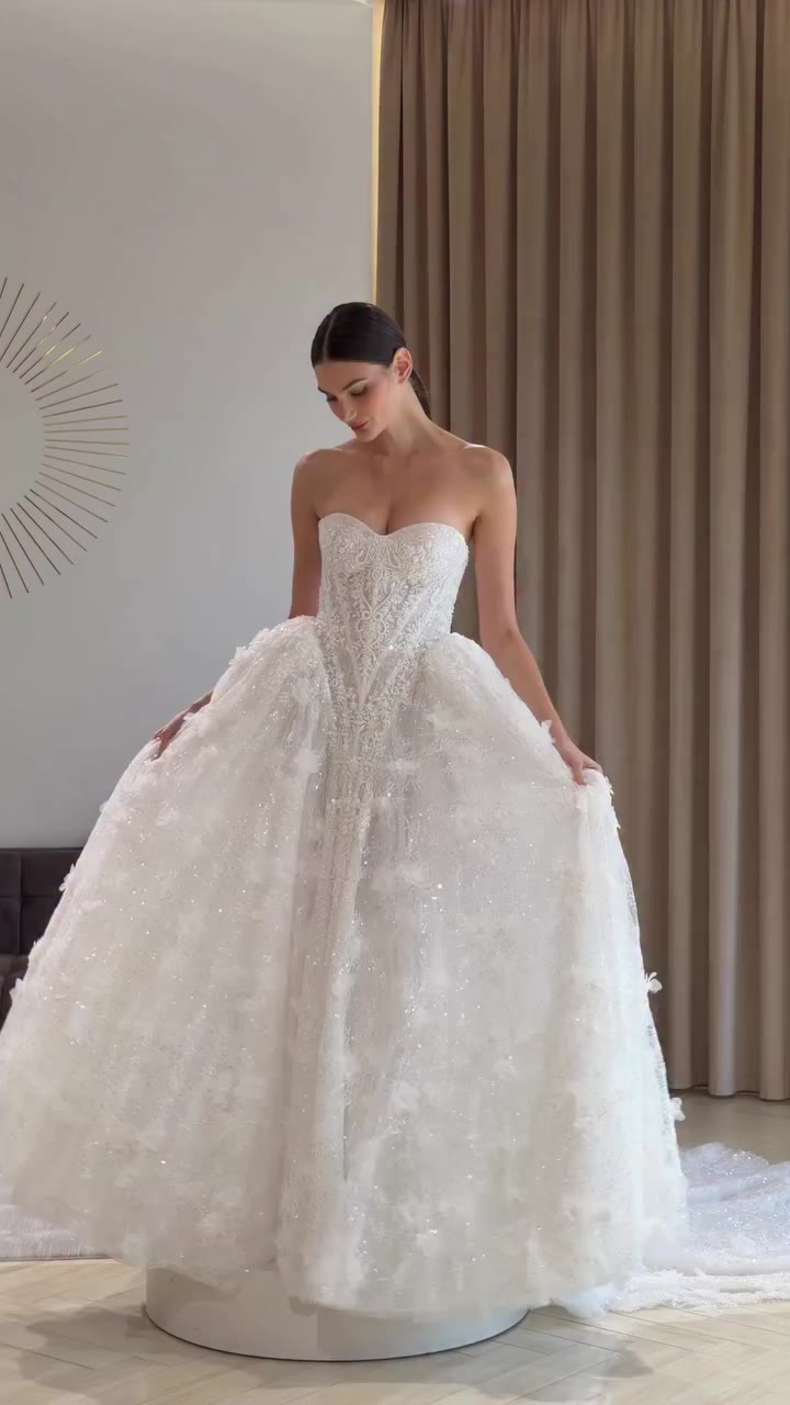 HECATE from the couture AMORE IN FIORE collection, styled with a statement…