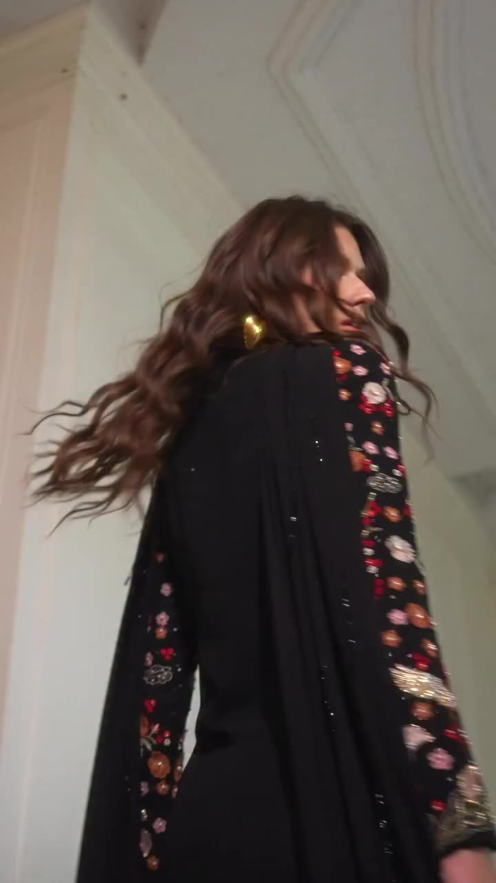 An exquisite chiffon creation, fully embroidered and enriched with intricate…
