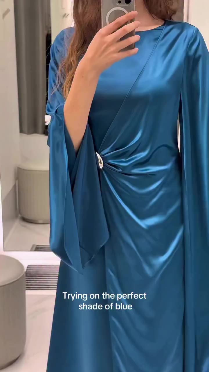 Satin elegance with an unexpected twist ✨ This satin maxi dress combines a…