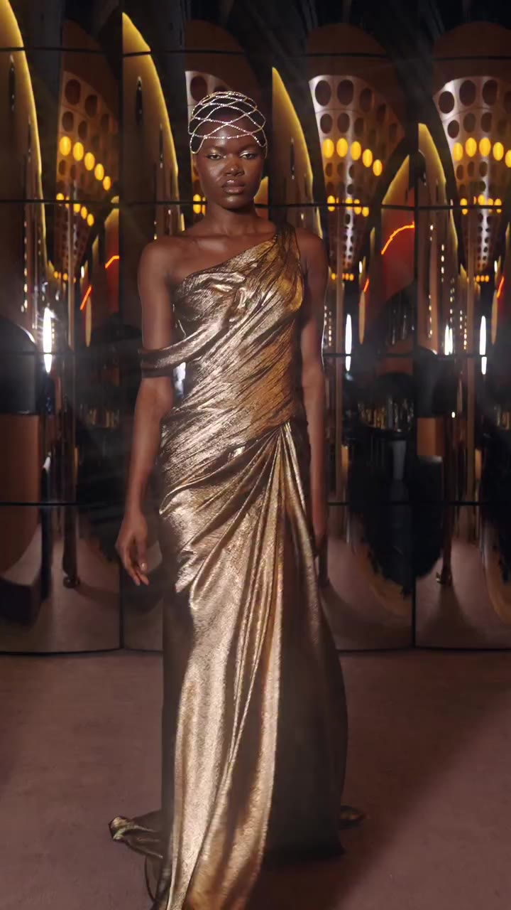 The richness of metallic bronze is expressed through exquisite draping…