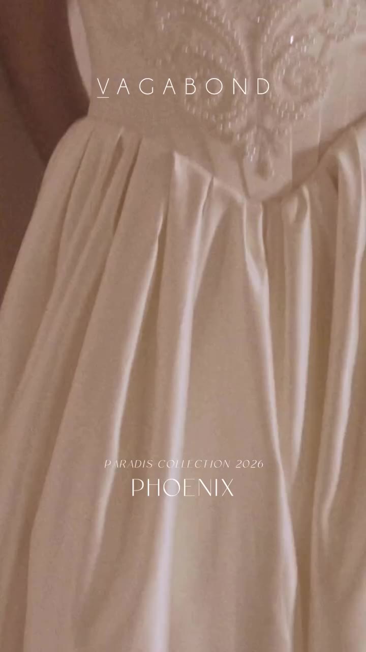Phoenix knows how to make an entrance. ✨ Sculpted ivory duchess satin, a…