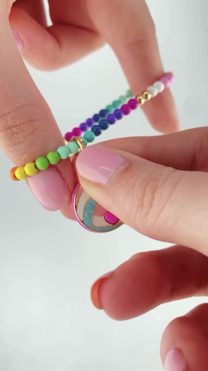 All her favorite activities, all in one bracelet! 🎨⚽️📣 Build a bracelet that…