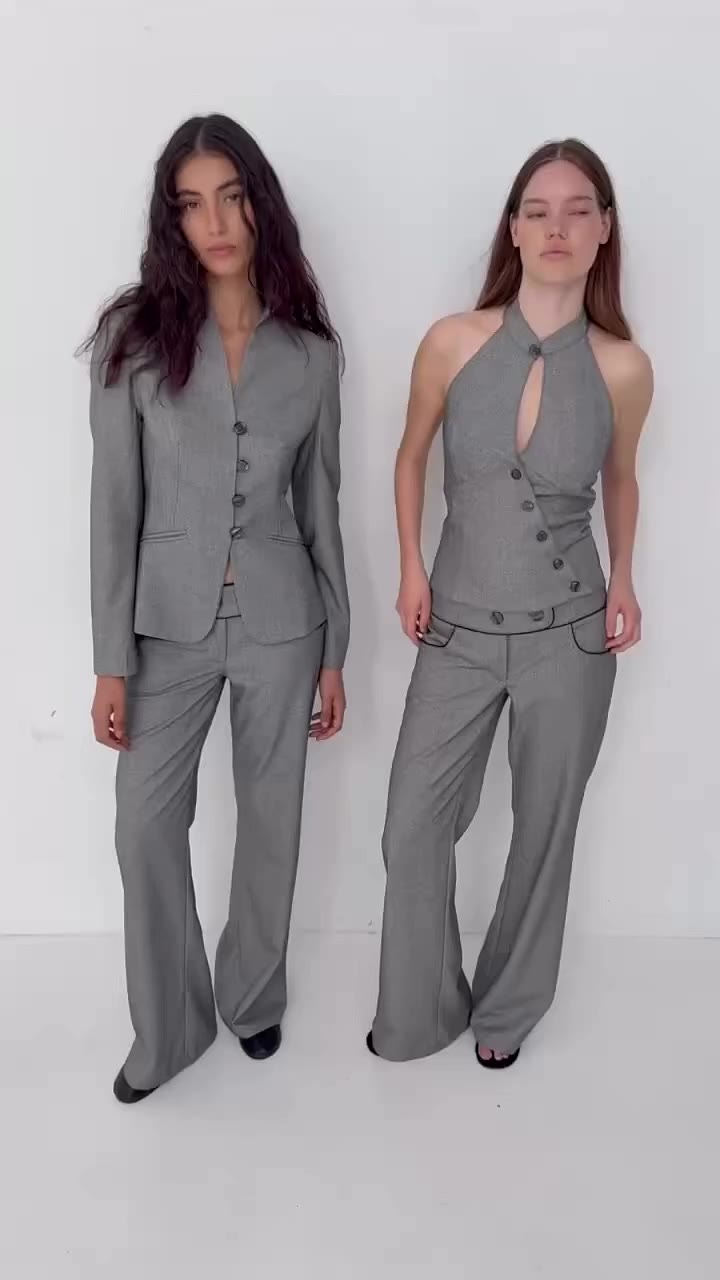 On set with Amira and Nina, styled in the Andrea Gray Pants and Jacket and the…
