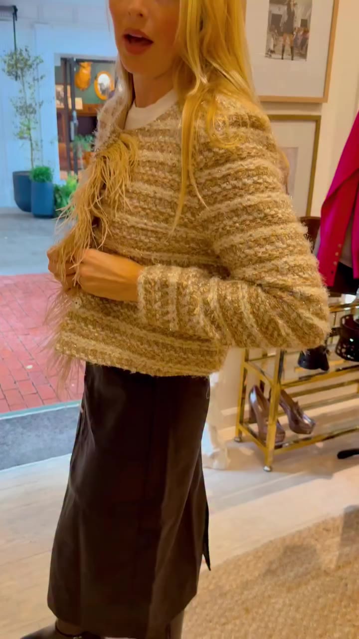 Cropped tweed coat embellished with diamantes and feathers… perfect look…