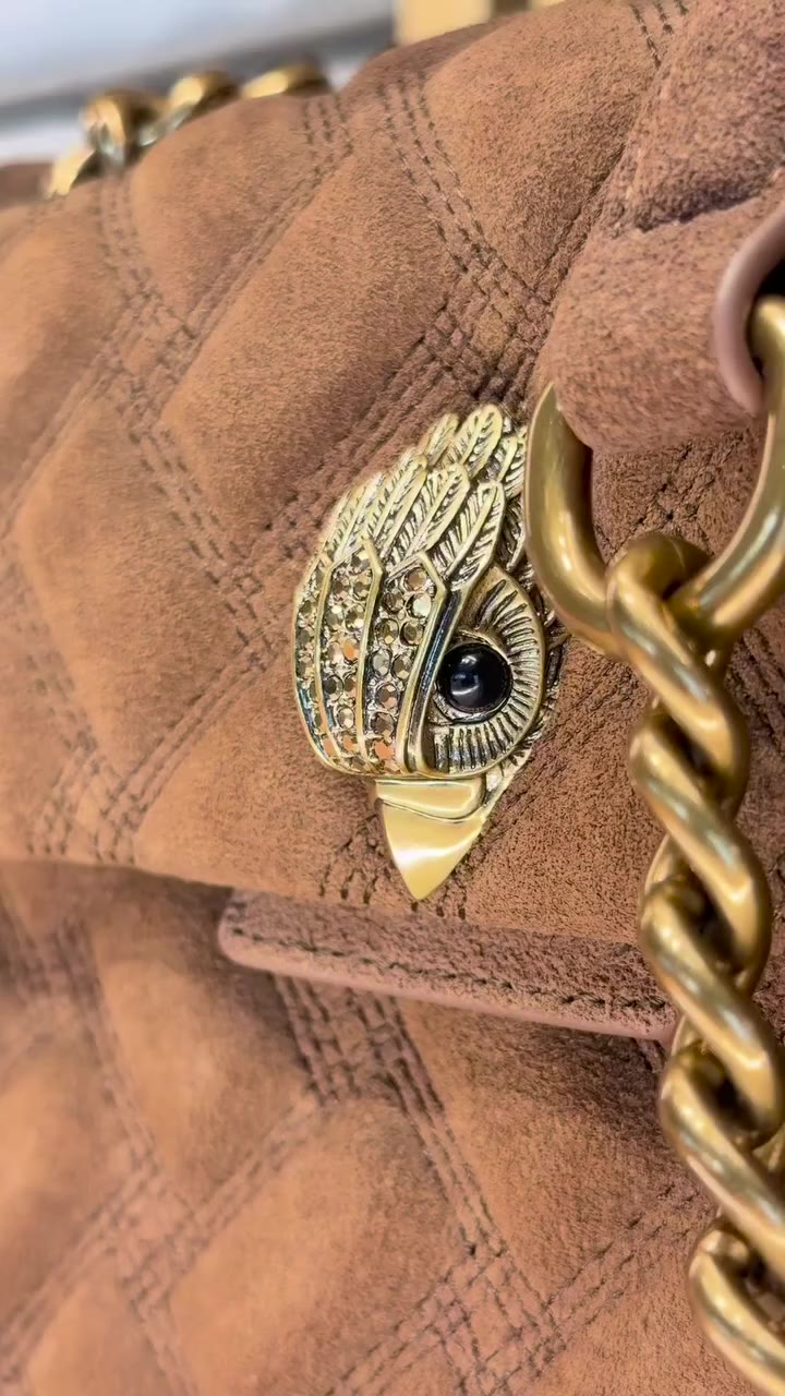 Soft suede. Considered stitching. Signature hardware. Every detail designed…
