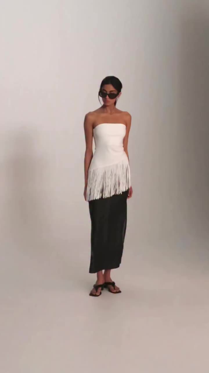 THE TIA, IN DEMAND. A favourite for a reason. The Tia Tassel Tank pairs a…