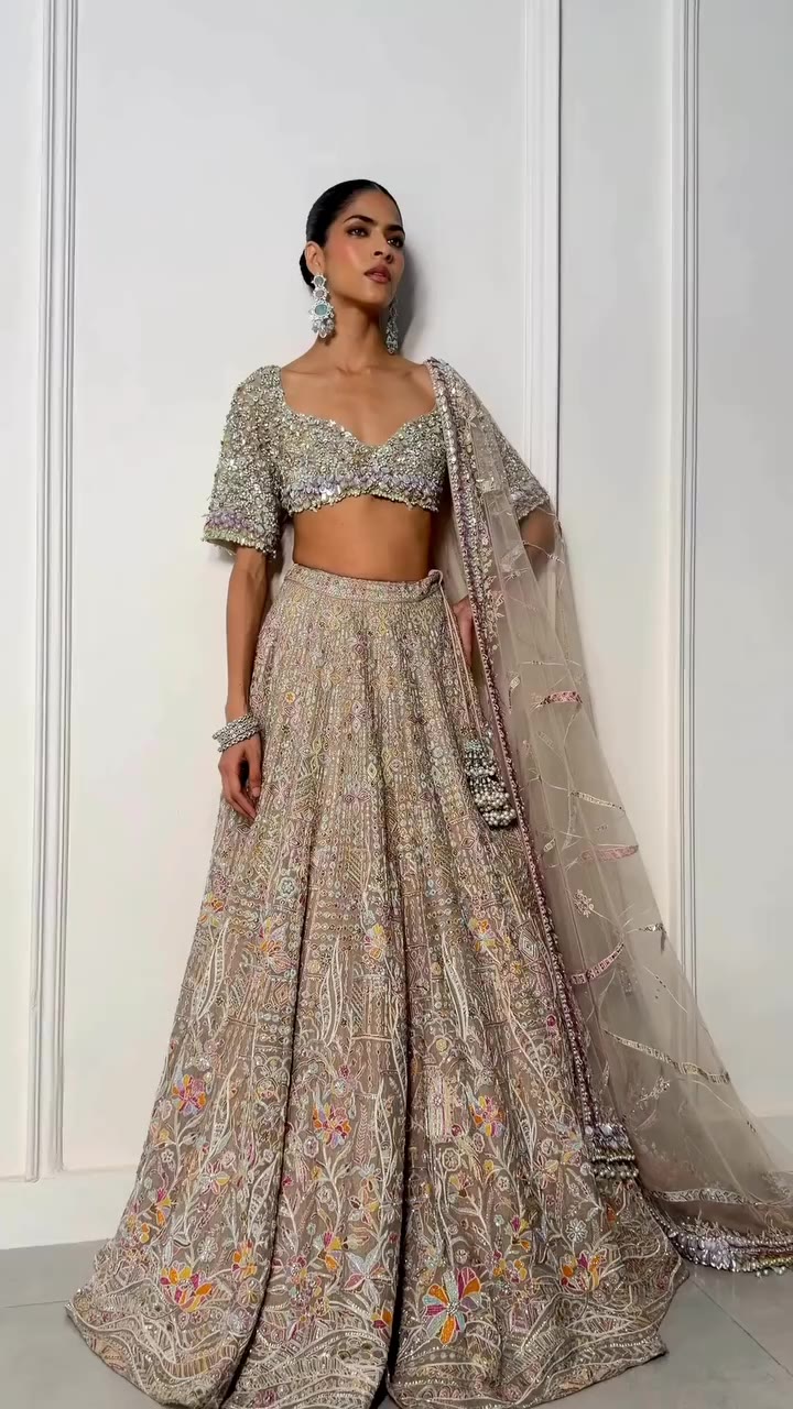 Where delicate pastels meet striking pops of bright orange and fuchsia. The…