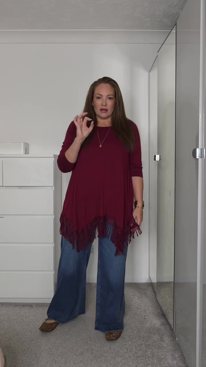 Deep red for autumn and a good pair of jeans. I love how long these tops are &…