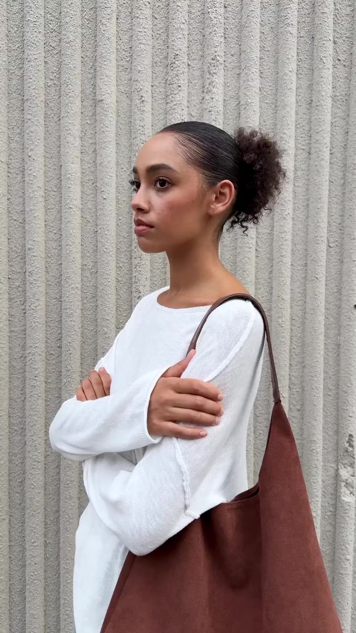 One top, way too many outfit possibilities.⁠ This white knit goes with…