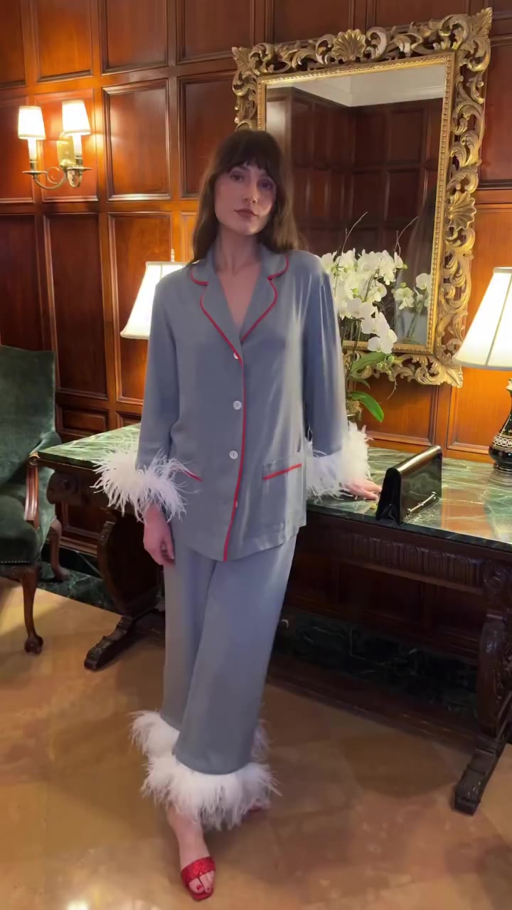 Feathers on, and ready for the entrance. Styling The iconic Party Pajama Suit…