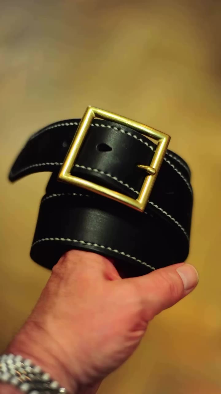 Hand saddle stitched English bridle hide belt on a Japanese brass buckle from…