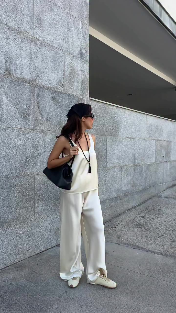 I always loved the contrast of a sneaker with a more sleek wardrobe…