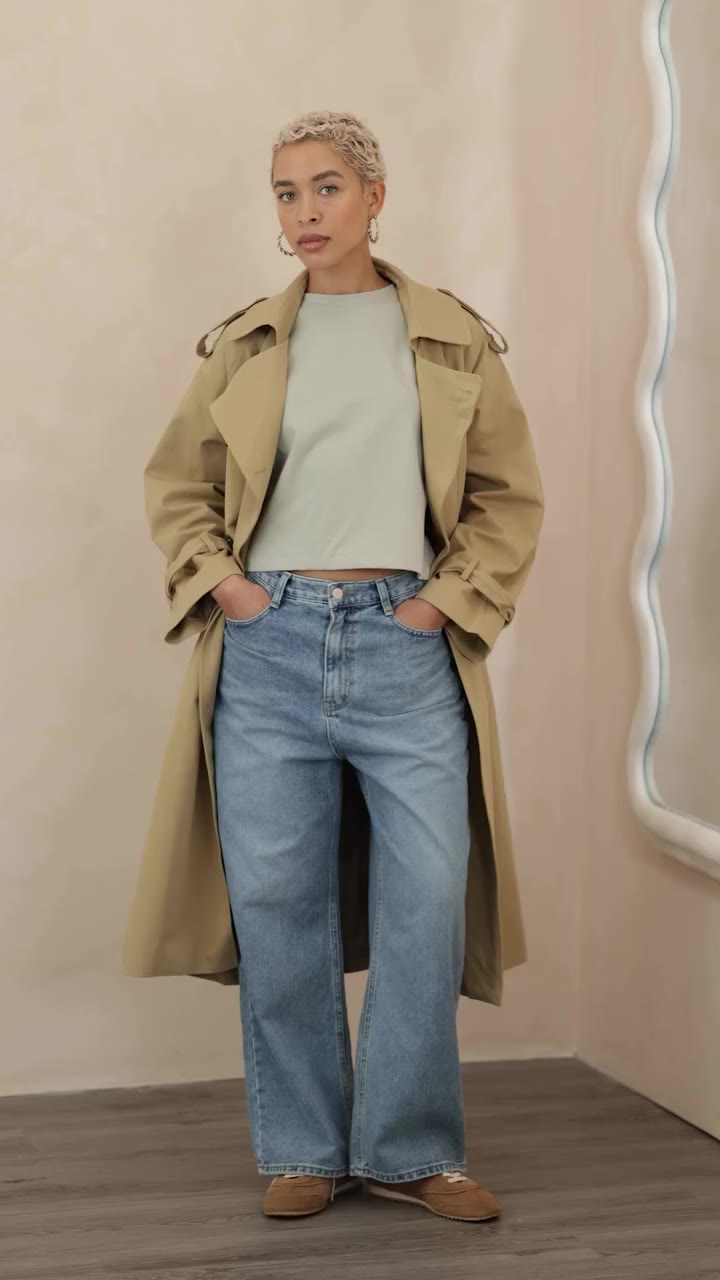 Open, buttoned or cinched. Same coat. Shop the trench in bio.