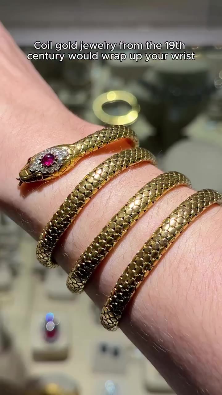 A 19th-century gold serpent bracelet. Its articulated, scale-patterned body…