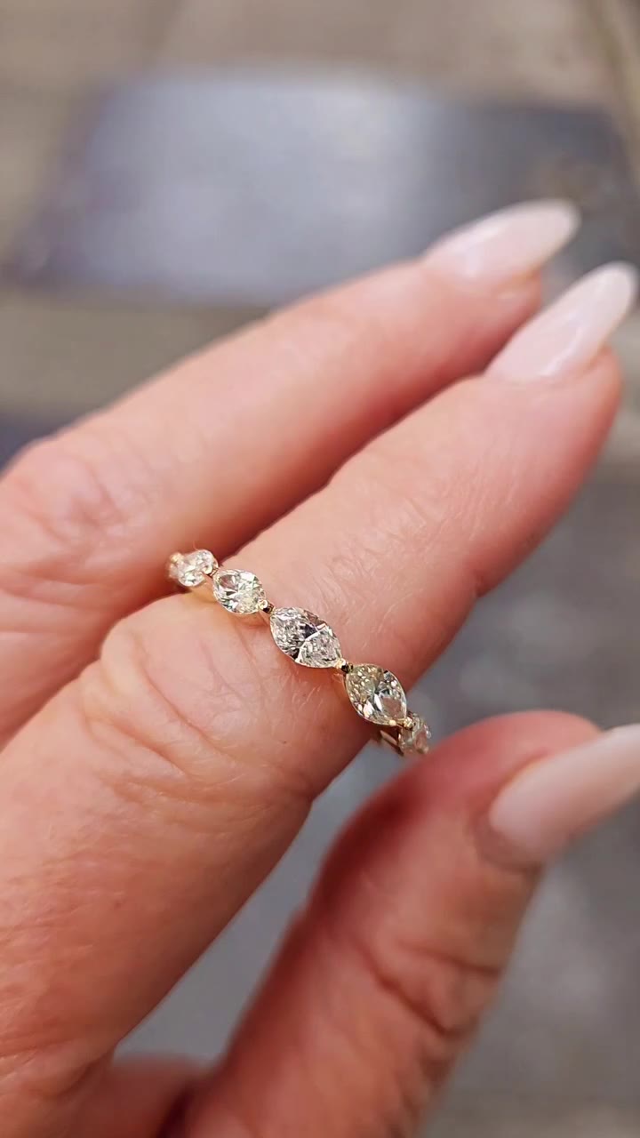 We created this gorgeous custom ring using our customer's marquise diamonds…