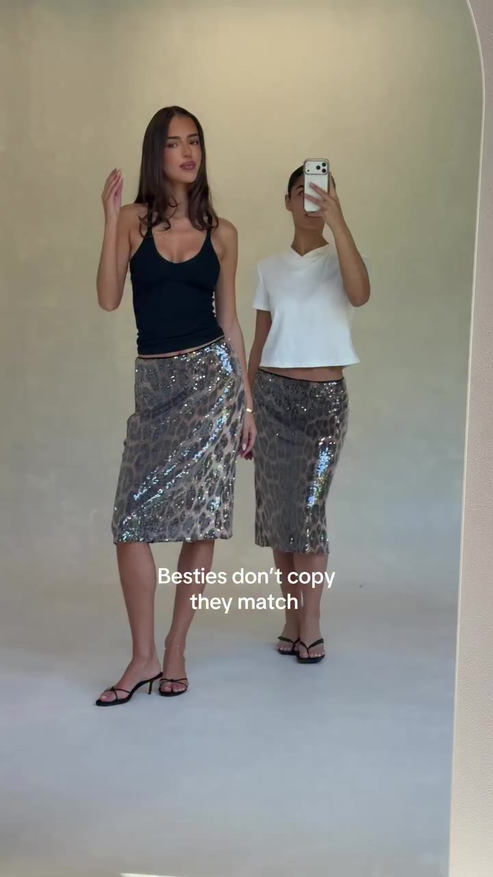 Besties don’t copy, they match. The Natalie Leopard Sequin Midi Skirt is…