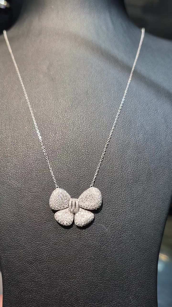 Gracefully tied, beautifully worn✨️ Authentic 18K White gold bow necklace with…