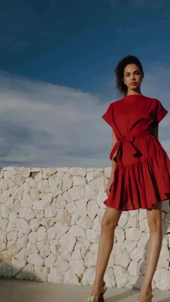 Sculptural sleeves, defined waist and beautifully gathered skirt, Emerald Mini…