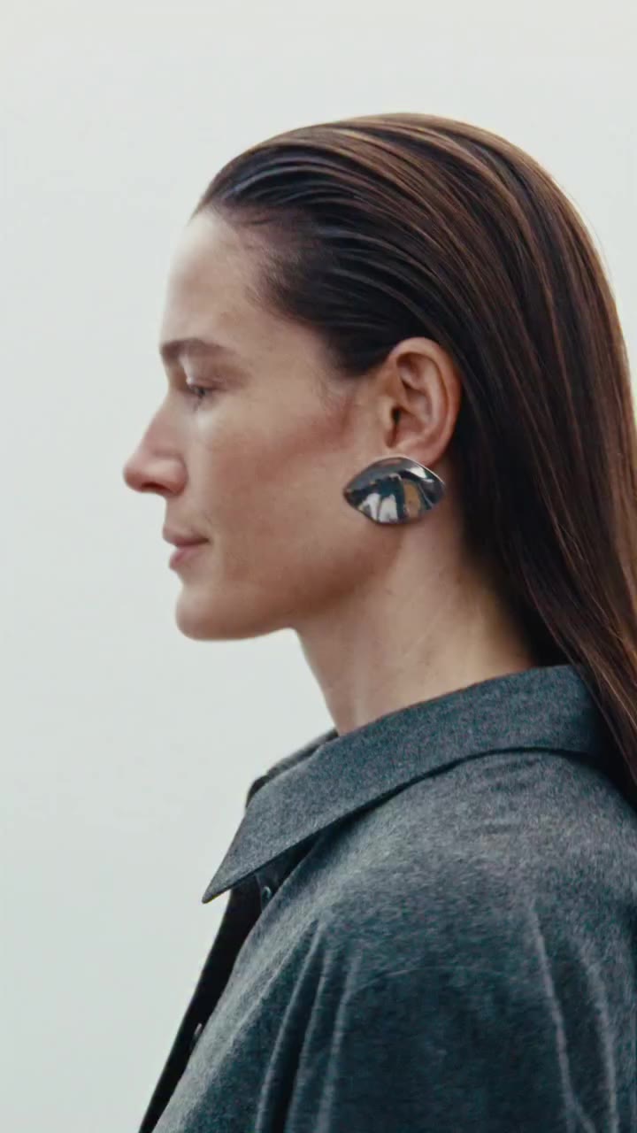 The Lumen Earring Large in motion.