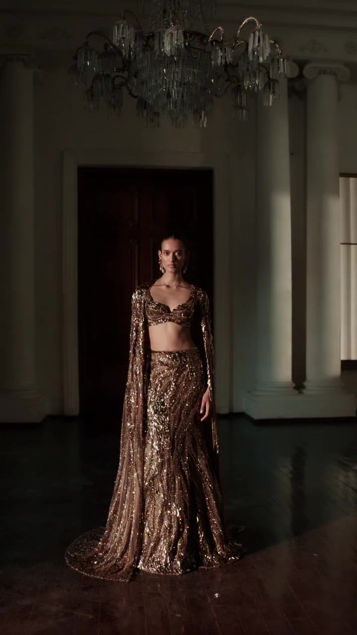 The Solar Flare Lehenga A study in molten radiance, the Solar Flare Lehenga is…
