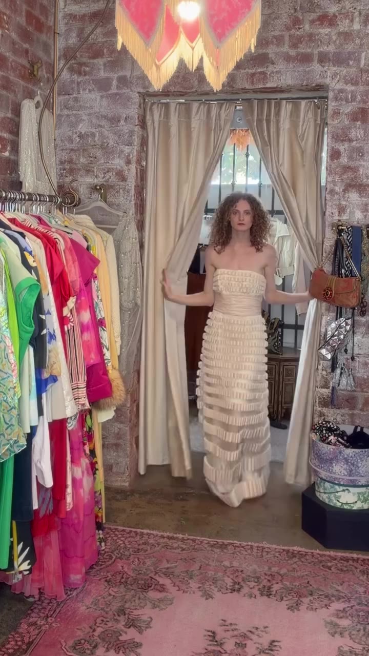 Vintage Carolina Herrera — strapless and beautifully sculpted, with tiers of…
