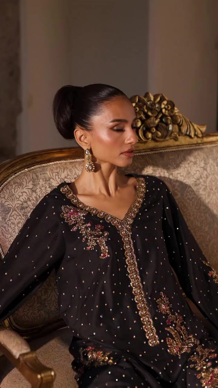 Nuit Elegance A striking expression of timeless elegance in deep black…
