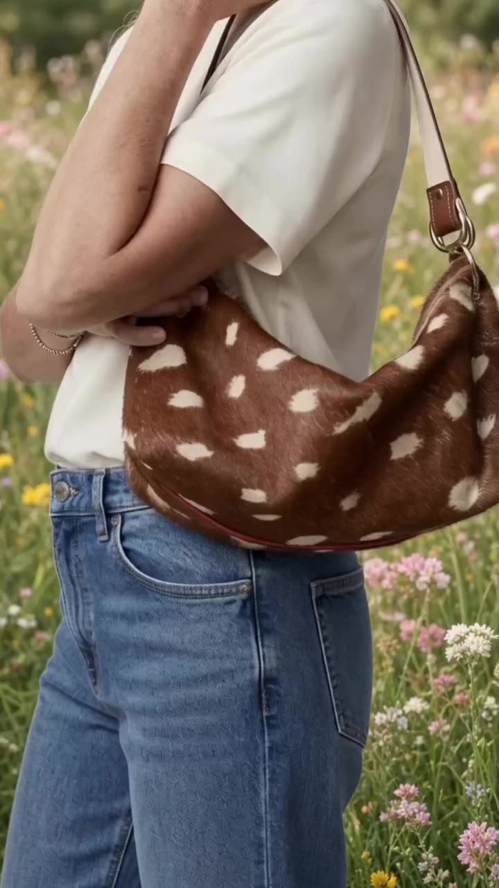 She moves from field to city without changing a thing. Fawn spots. Field…