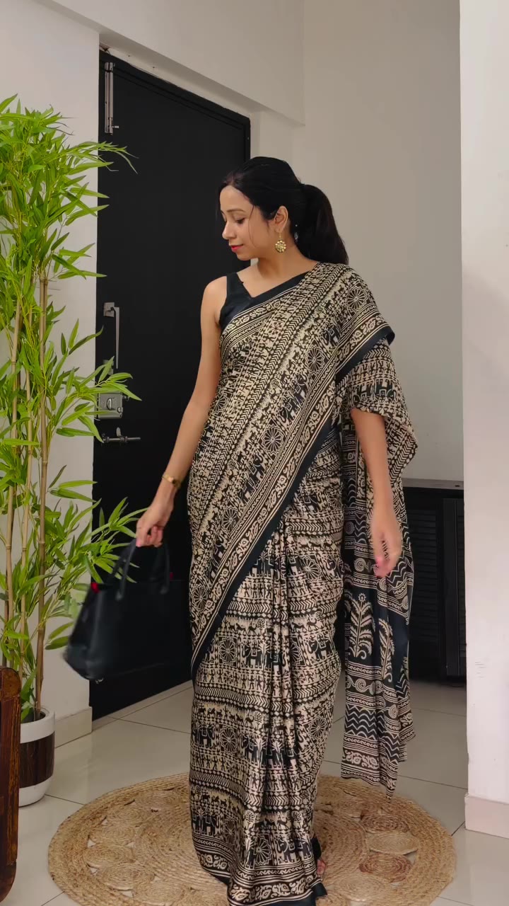 * Fabric: Satin silk saree * Colour: Black & Beige * Design: Traditional…