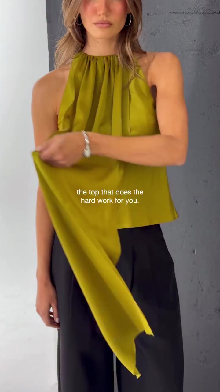 Introducing our Cassia Top. An elegant high-neck silhouette elevated by a…