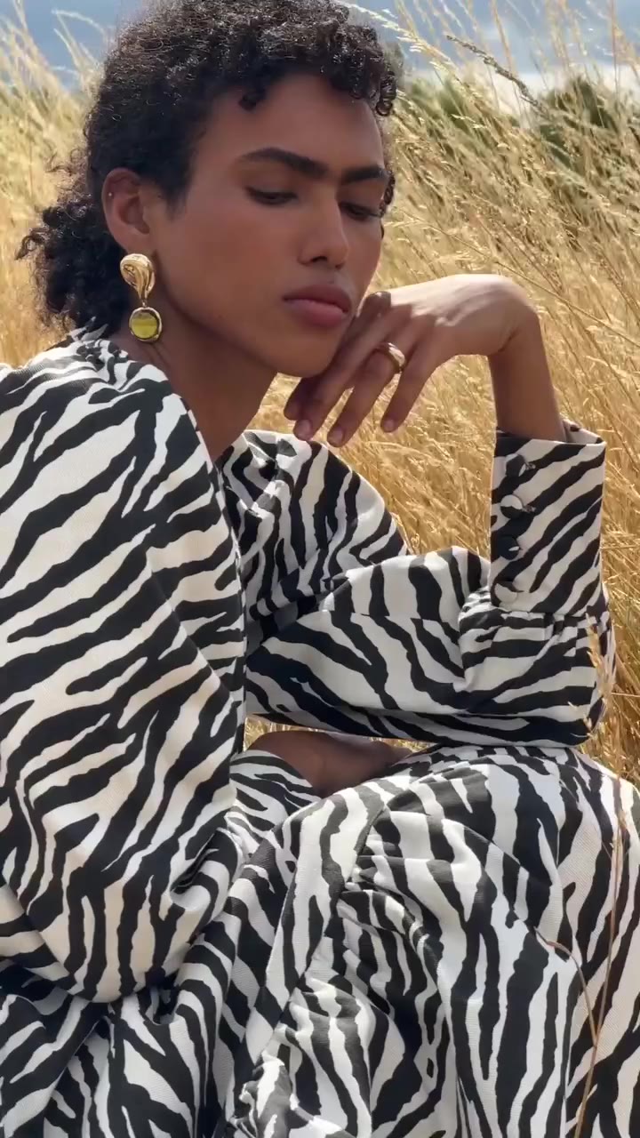 Meet the Melia Zebra Midi Dress, where bold zebra print meets romantic…