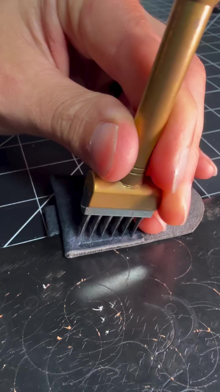 Punching stitching holes #leatherasmr #leatherwork #leathercraft…