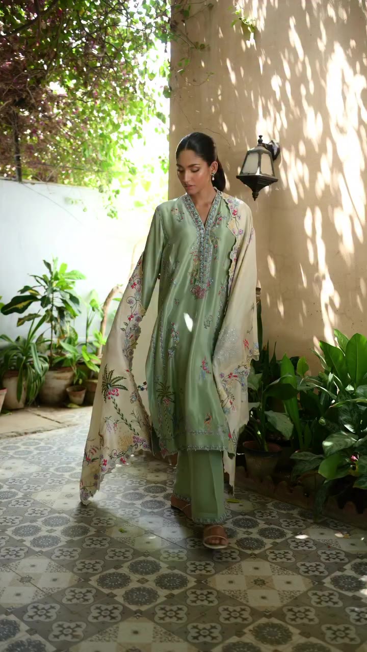 A serene palette of soft mint and ivory, brought to life with intricate…
