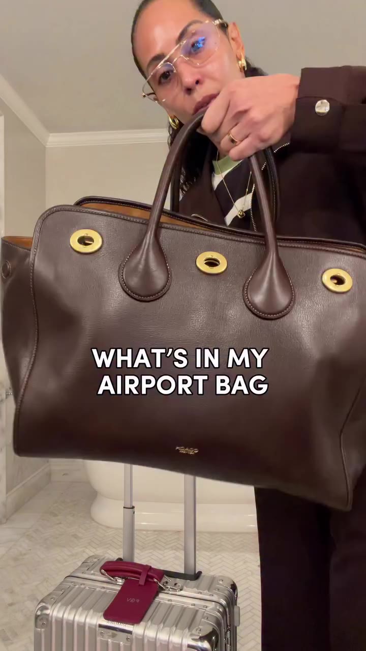 What’s in my airport personal item bag ✈️ My Coach Turnlock 40 tote with a mix…