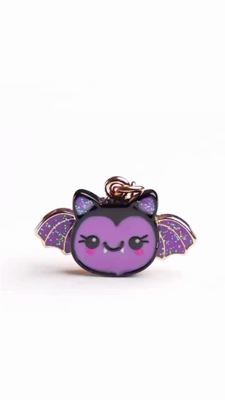 Cute with a little bite! 🦇💜✨ This glittery bat is ready to fly into her…