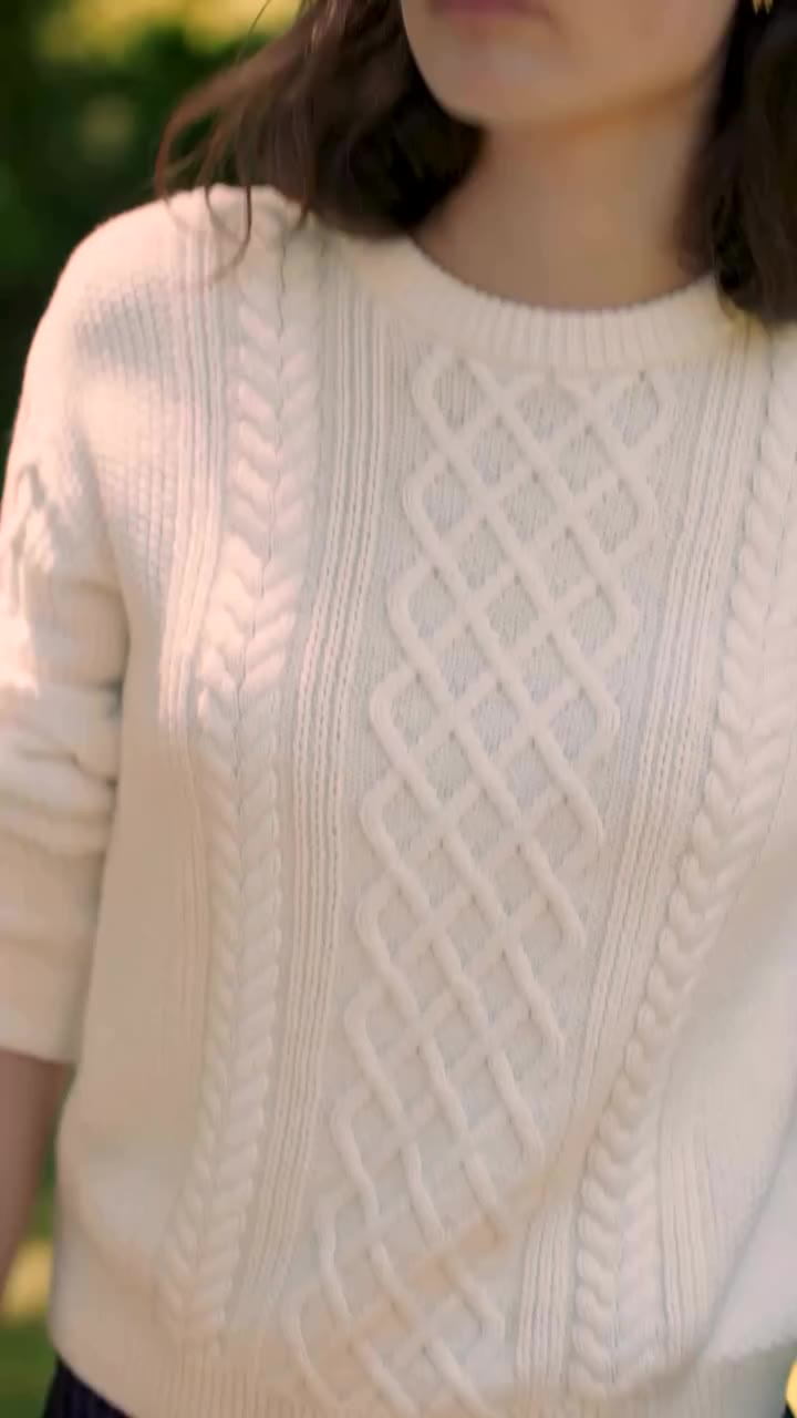 Field day, all grown up. Meet you there in our 100% cotton cable-knit sweater.
