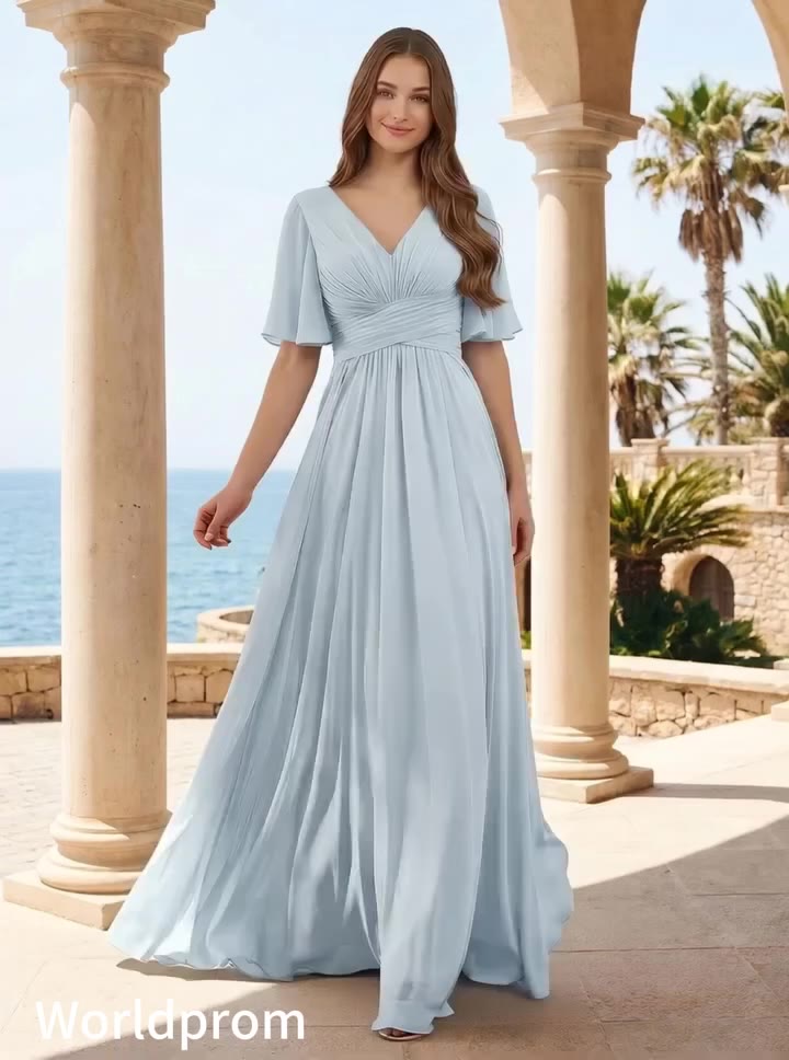 Falling in love with the soft pleats and flutter sleeves on this light blue…