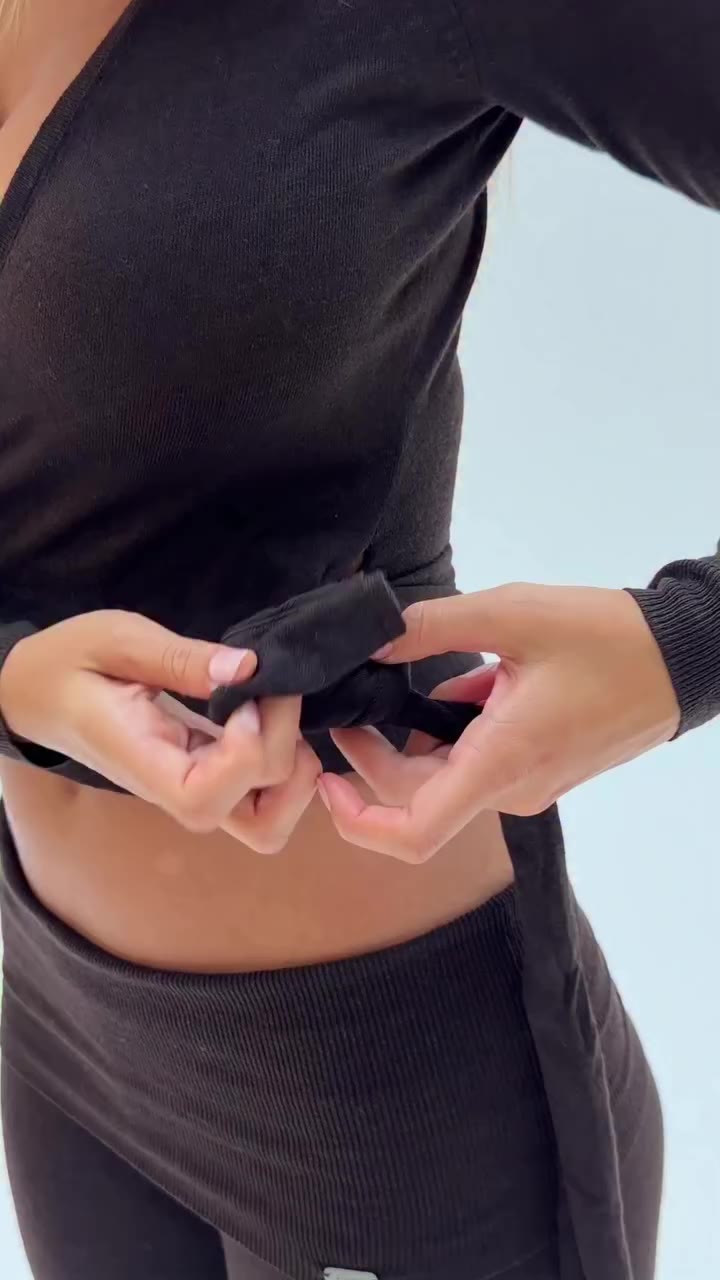 Wrapped in comfort. Essential Knit Wrap Sweater and Foldover Pant.