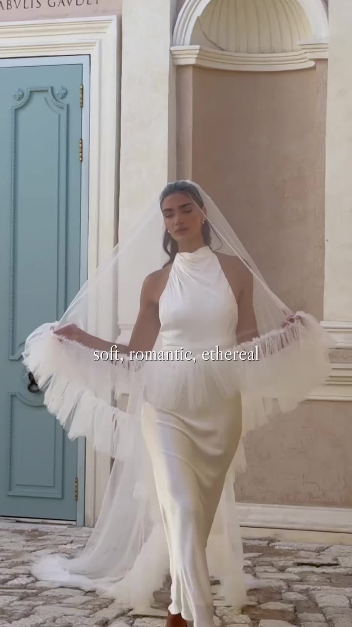 She’s here ✨ The veil you’ll want to see from every angle 🤍 Two tiers of…